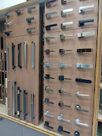 A wall display board of cabinet and door handles in brass, chrome and black finishes.