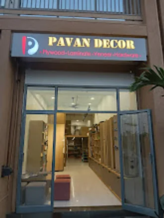 The Pavan Decor shopfront at The Twin Towers, Hanspura, with the shop name above the entrance and stock visible inside.